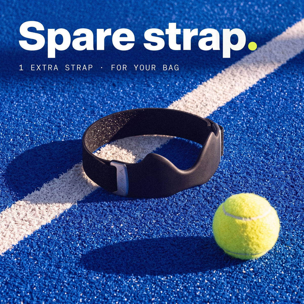 a spare Second Set strap in Ink on a padel court, one extra strap for your bag.