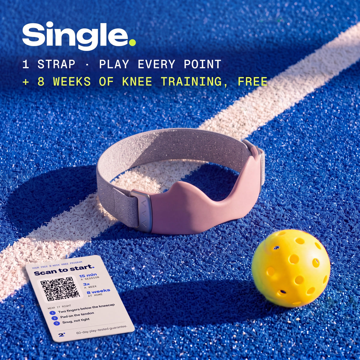 One Blush Second Set strap on a pickleball court, with the free 8-week knee training card
